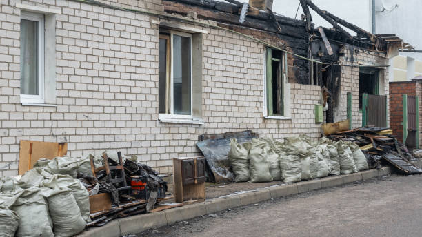 Professional Fire Damage Restoration technician working in New Lisbon, WI